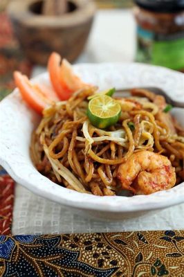  Mie Goreng: Ein schlicht-aromatisches Nudelgericht aus dem Herzen Kualas Lumpurs!